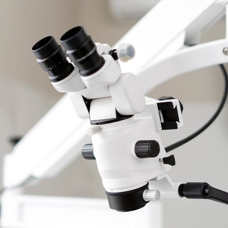 a high-precision dental surgical microscope used to enhance vision during complex procedures like root canals